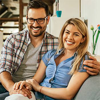 Couples Therapy - Picture of a Happy Couple on Couch
