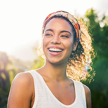 Individual Therapy - Picture of a Happy Woman Standing Outside