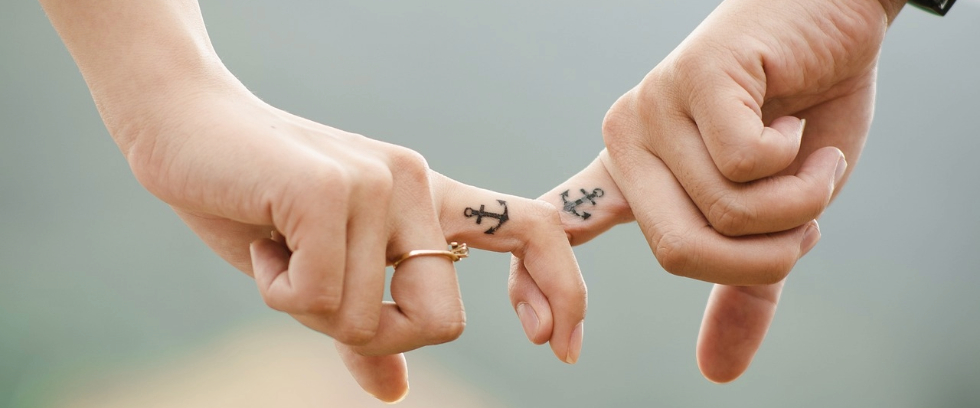 Couple holding hands